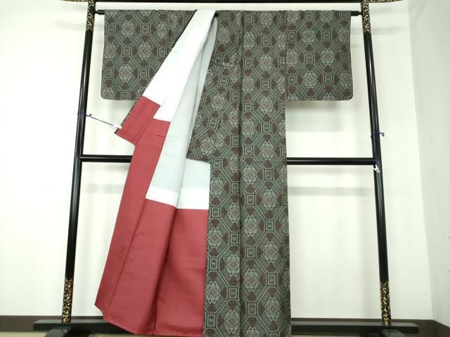 平和屋着物○本場大島紬 割り込み絣 蜀江花文 正絹 逸品 未使用  