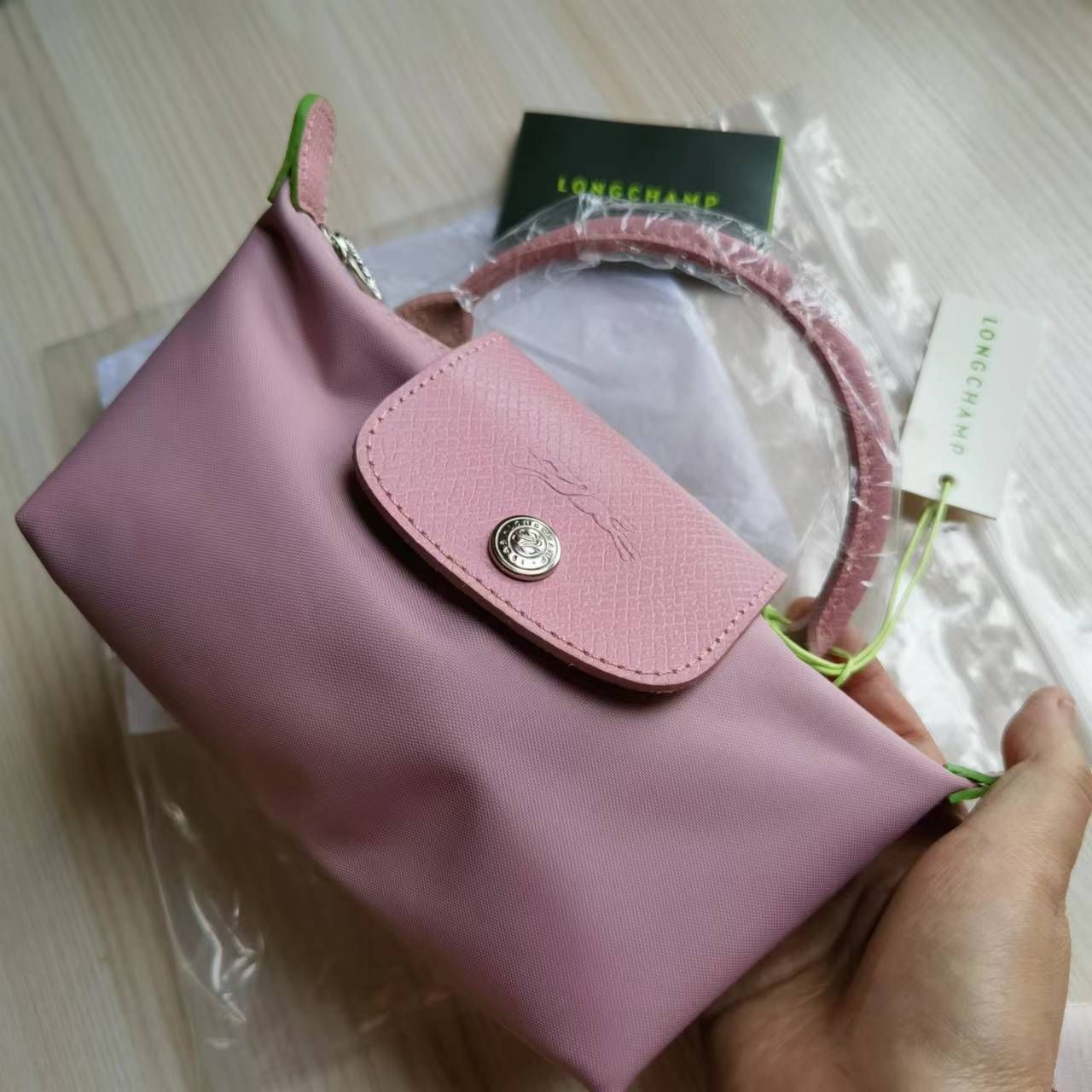 新品 longchamp ロンシャン ハンドル付きポーチ ピンク