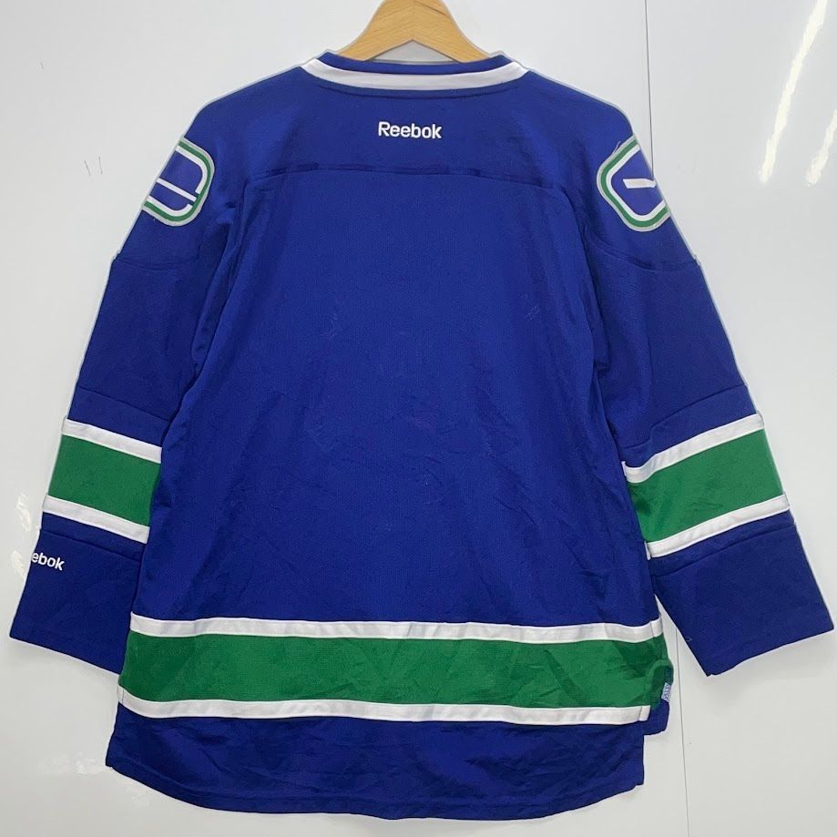 NHL ゲームシャツ　ビックプリント　オーバーサイズ　ストリート　カジュアル古着 Reebok NHL リーボック エヌエイチエル フットボール VANCOUVER