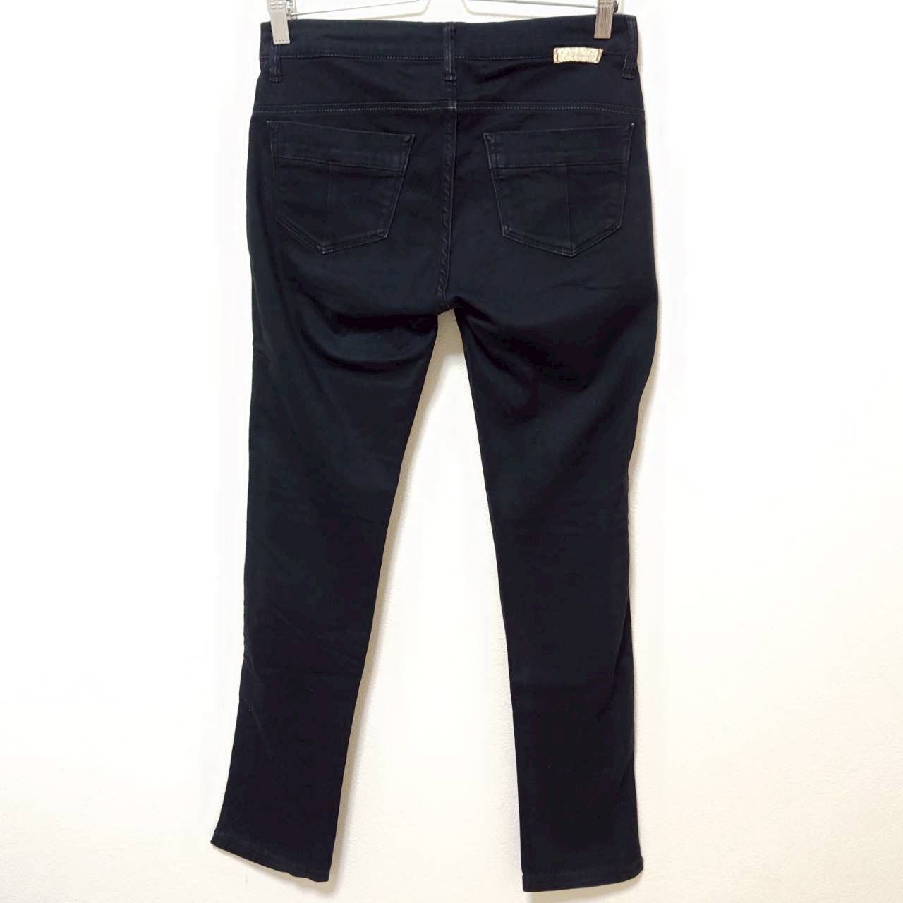 モノトーンコーデ コンチョボタン