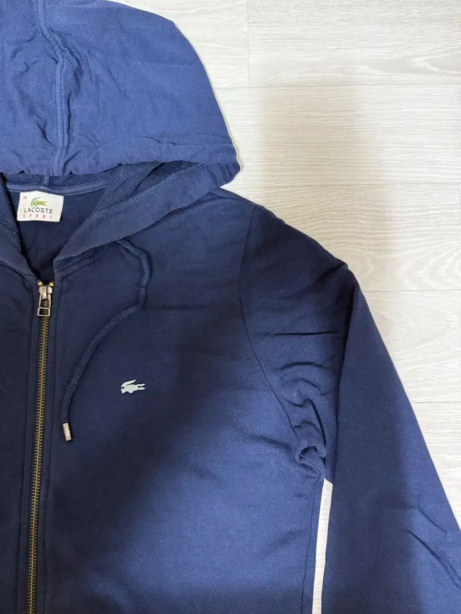 LACOSTE(ラコステ) ジップアップパーカー フード付き - メルカリ