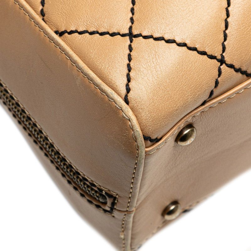 CHANEL シャネル　レザー手袋　ココマーク　ベージュ CHANEL Beige Coco Kelly Leather Handbag | Tuckernuck Archive
