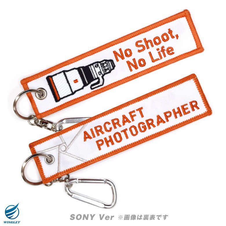 航空写真家 ソニー キャノン ニコン タグ キーホルダー カラビナ 付き PHOTOGRAPHER SONY CANON NIKON カメラ  カメラマン 望遠レンズ 飛行機 空港 基地 戦闘機 ブルーインパルス 自衛隊 航空祭 プロ 航空 グッズ アイテム