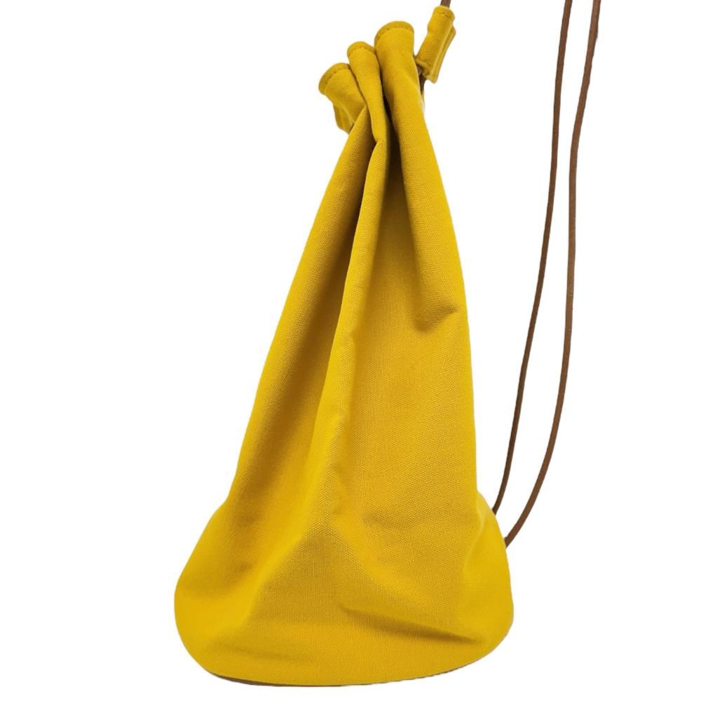 HERMEポロションミミルPMキャンバスショルダーバッグイエロー巾着バッグ HERMES 【美品】HERMES エルメス ポロションミミル 巾着