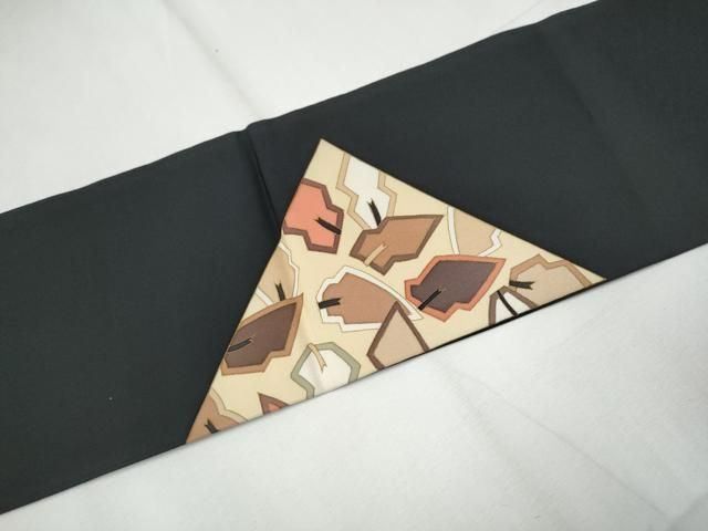 平和屋着物○塩瀬 九寸名古屋帯 型染め 切嵌枝葉文 黒地 金彩 正絹