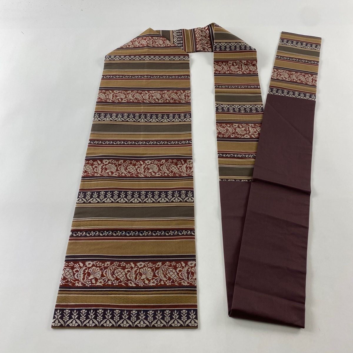 しもページ 名古屋帯 美品 逸品 手長猿 蔓 金彩 山吹茶色 正絹 中古（名古屋