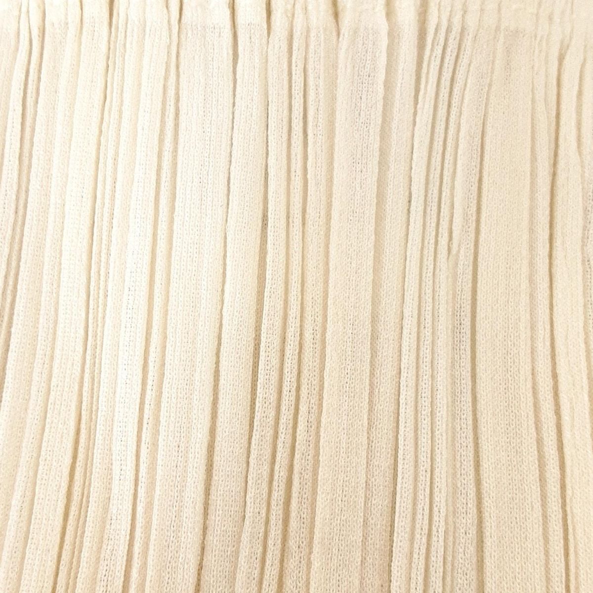 PLEATS PLEASE