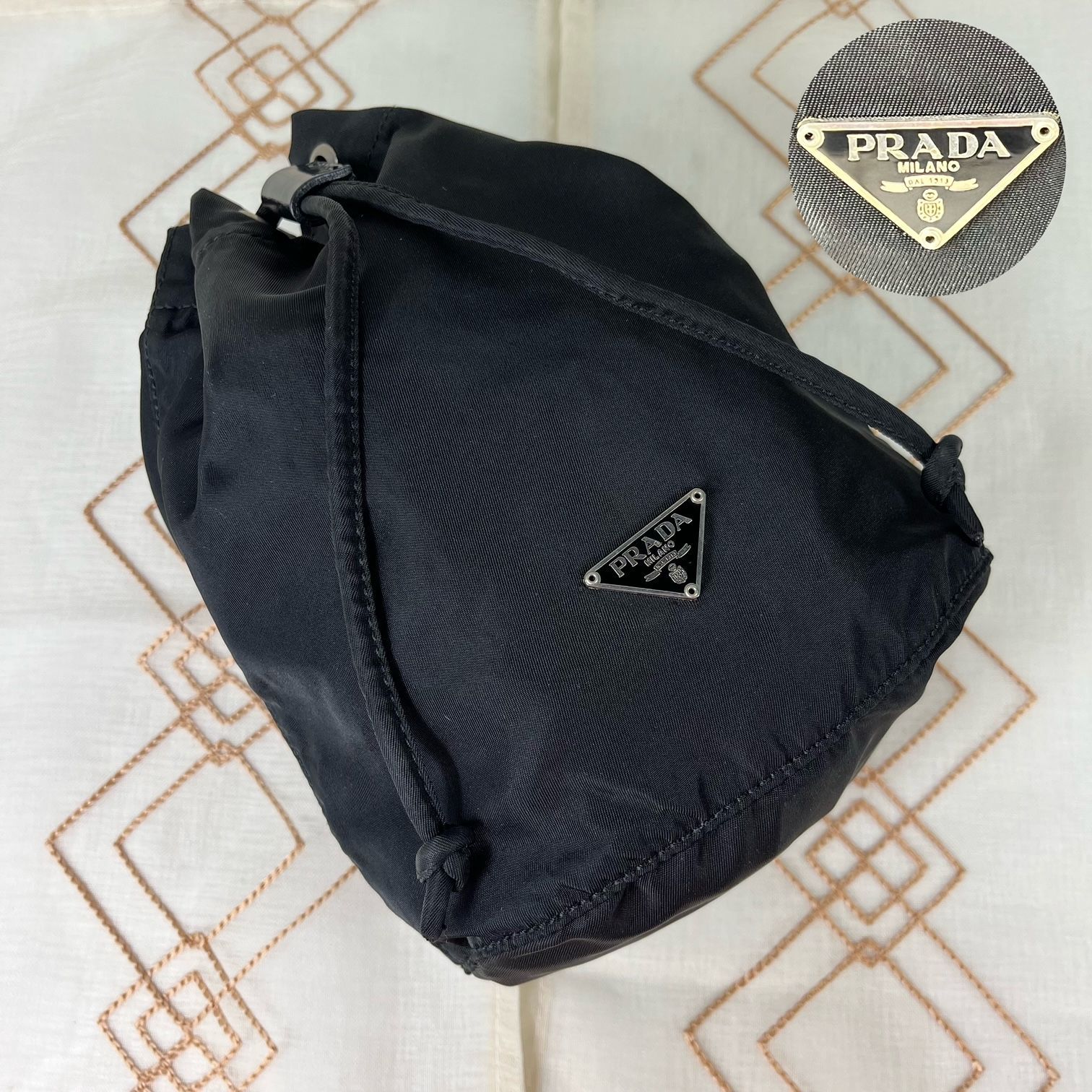 購入元【美品】PRADA プラダ 巾着型ナイロンポーチ 三角ロゴ - ポーチ