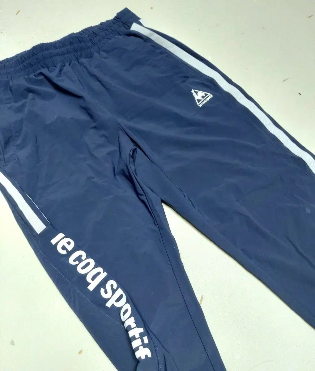 le coq sportif(ルコックスポルティフ) メンズトレーニングパンツ 30 /トラックパンツ ジョガーパンツ/パッケージ