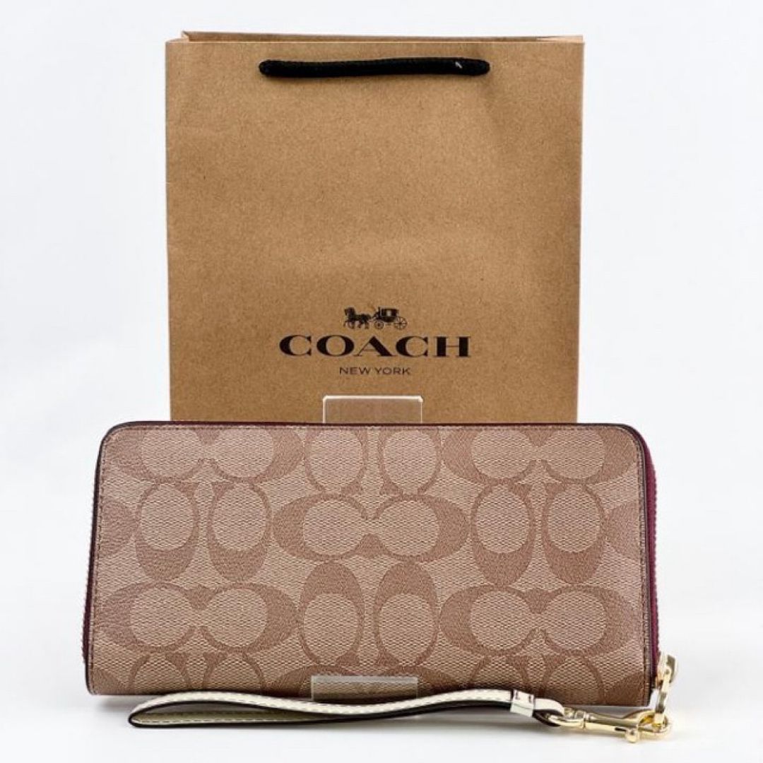 新品 COACH x スヌーピー ストラップ付き 長財布 PEANUTS 革 - メルカリ