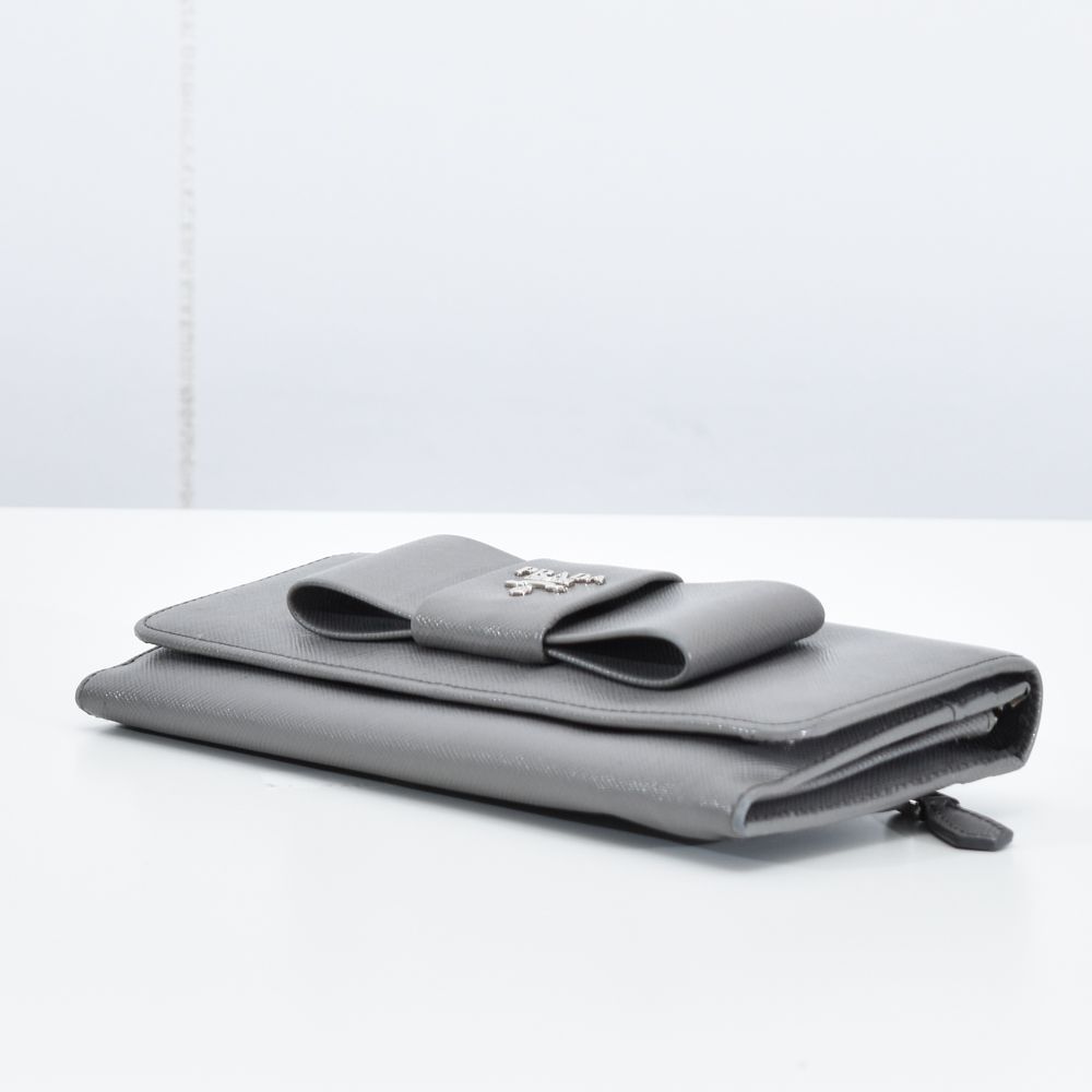中古USED PRADA 財布 フラップ リボン サフィアーノ 7929226882 中古USED PRADA 財布 フラップ リボン サフィアーノ 7929226882
