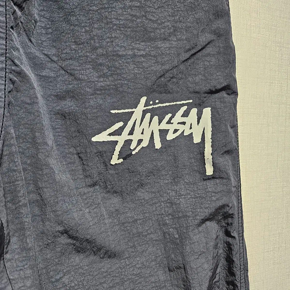 r*r様 stussy × NIKE ビーチパンツ オフノワール サイズM Nike Stussy Beach Pants Off Noir Mサイズ - メルカリ