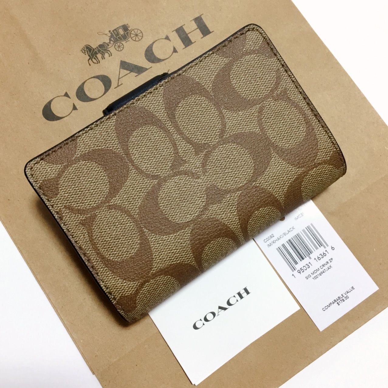 COACH コーチ シグネチャー カーキ ブラック 黒 二つ折り財布 - メルカリ