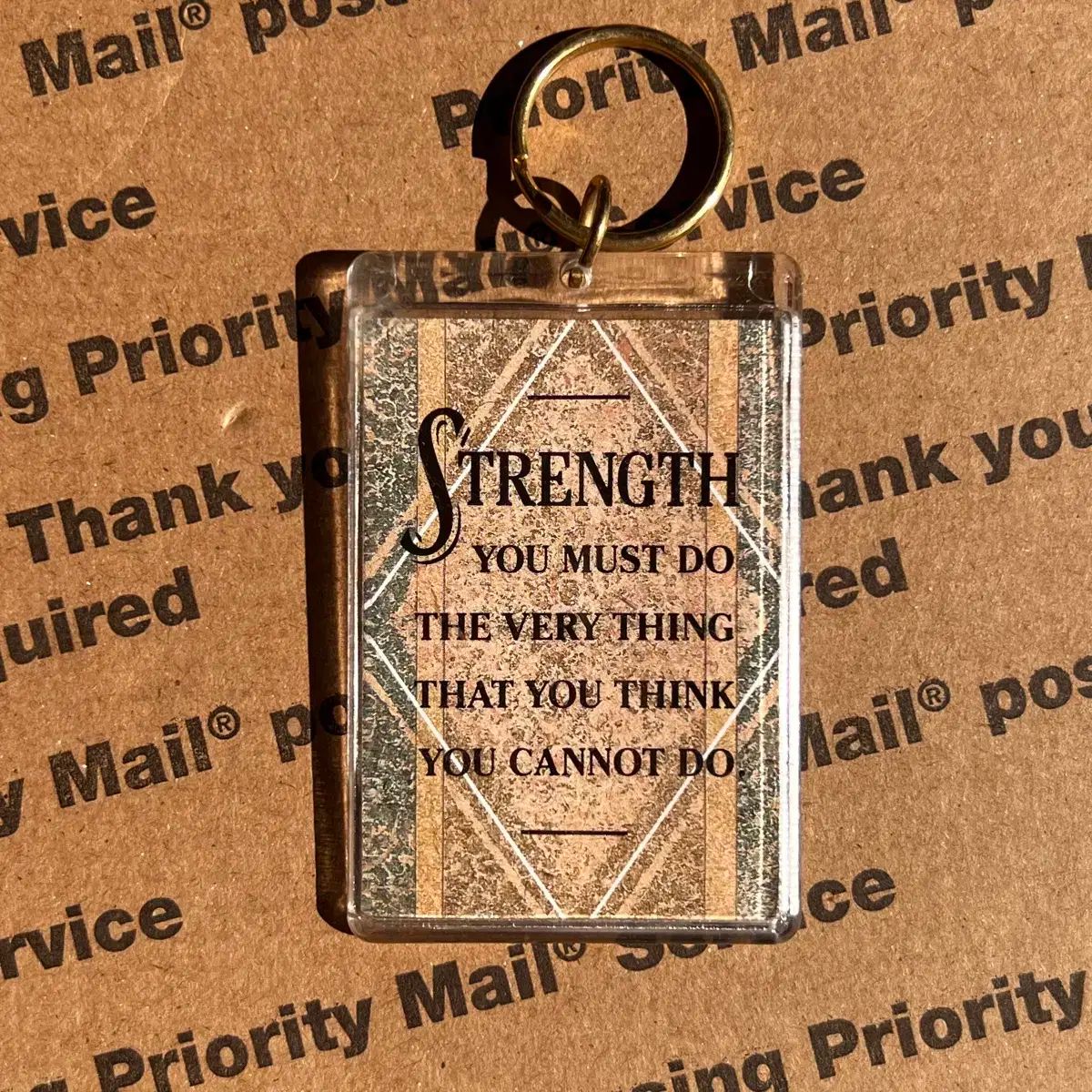 90s vtg Strength Quote Keyring