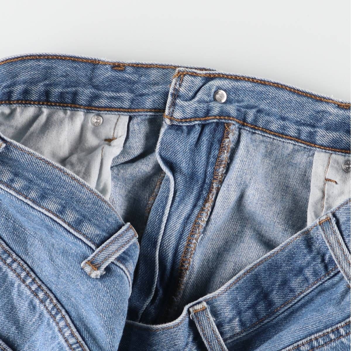550 テーパードデニムパンツ