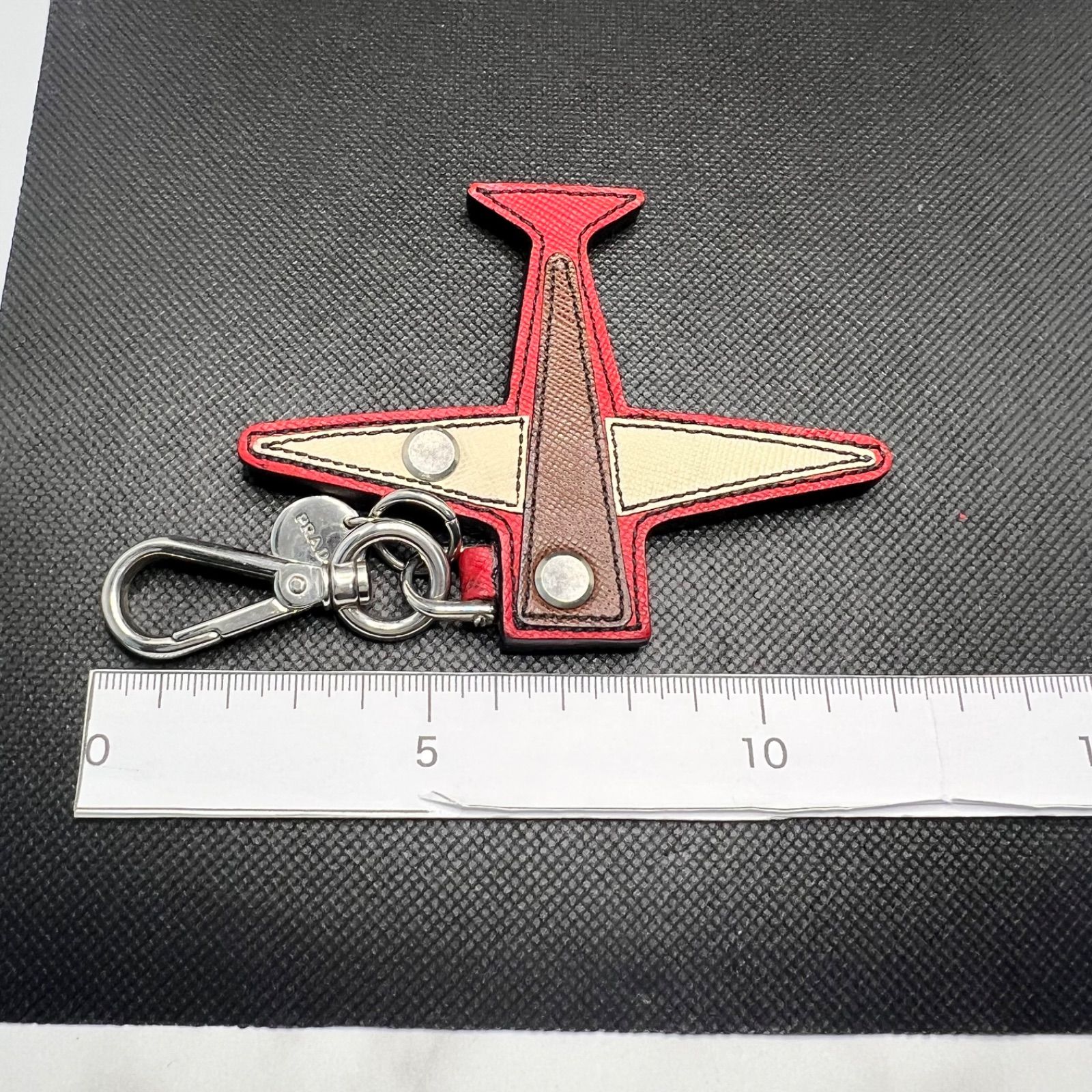 PRADA プラダ キーホルダー チャーム 飛行機 レザー - メルカリ