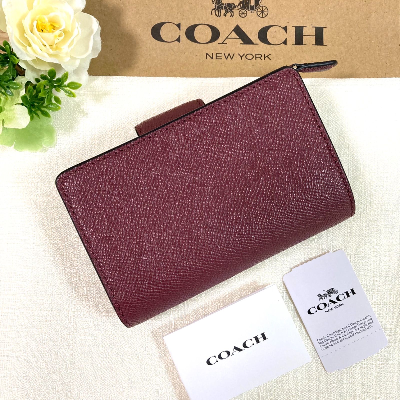 コーチ COACH長財布エンボス 凹凸が美しいデザインの高級感高いワイン