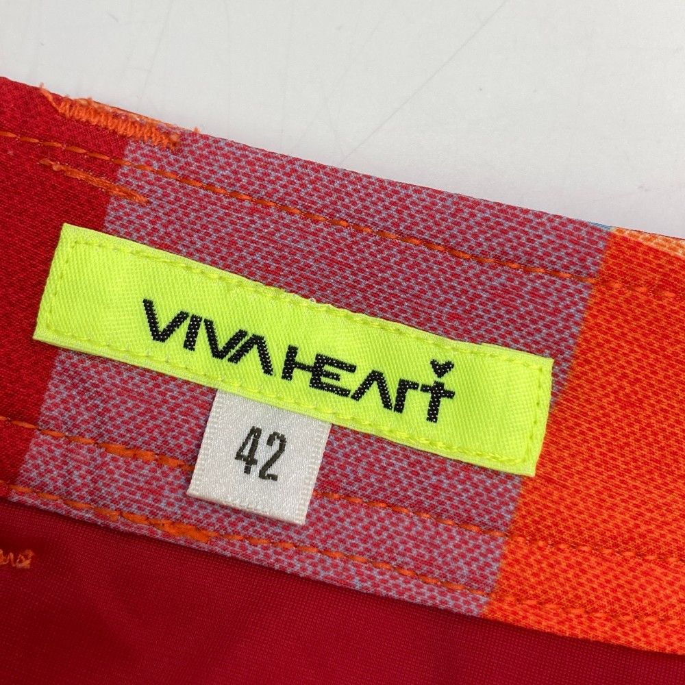 サイズ：42 VIVA HEART ビバハート  インナー付スカート チェック柄 オレンジ系 [240101462421] ゴルフウェア レディース ストスト サイズ：42 VIVA HEART ビバハート インナー付スカート チェック