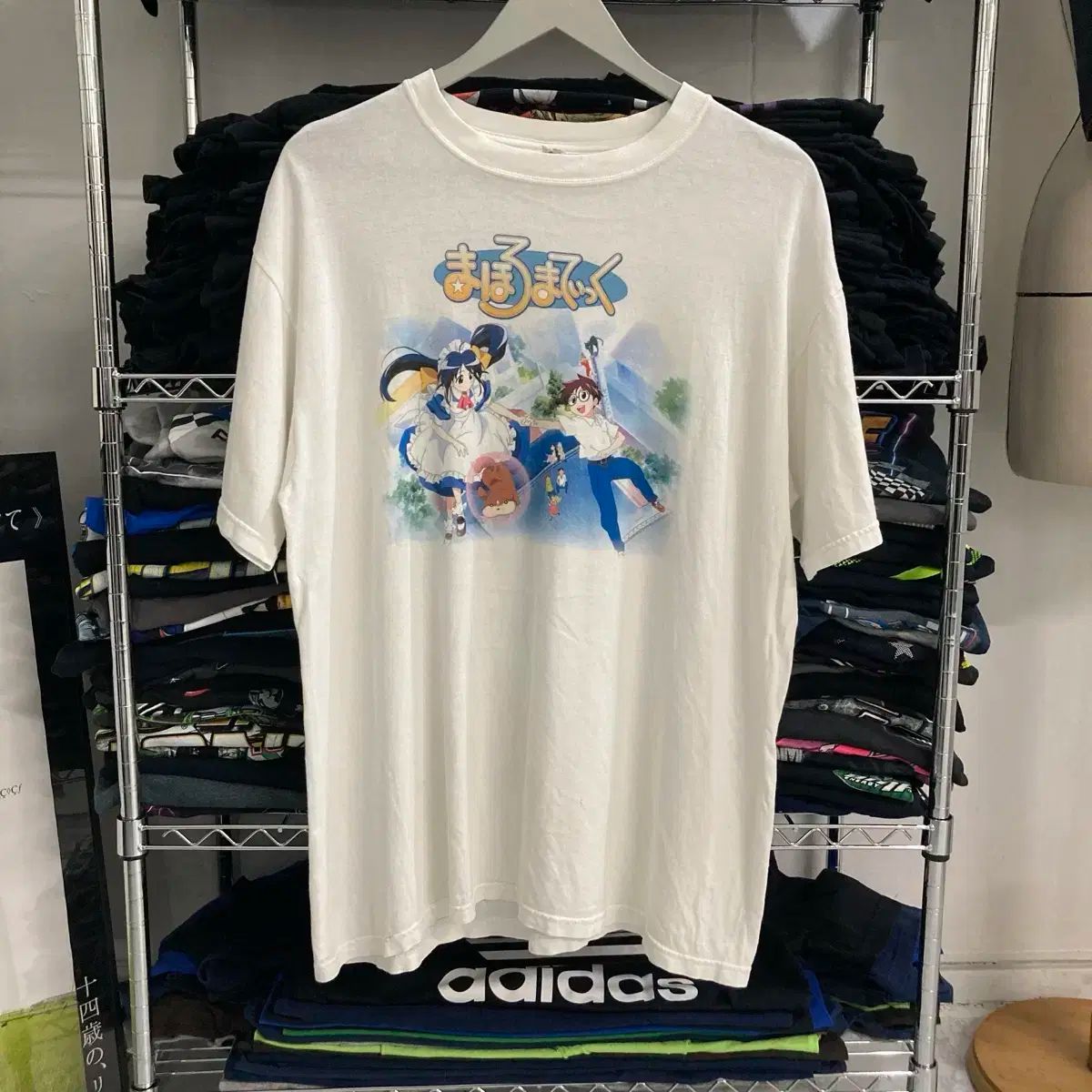 新品】パーリーゲイツゴルフシャツコラボスヌーピーカットソーロンT紺0