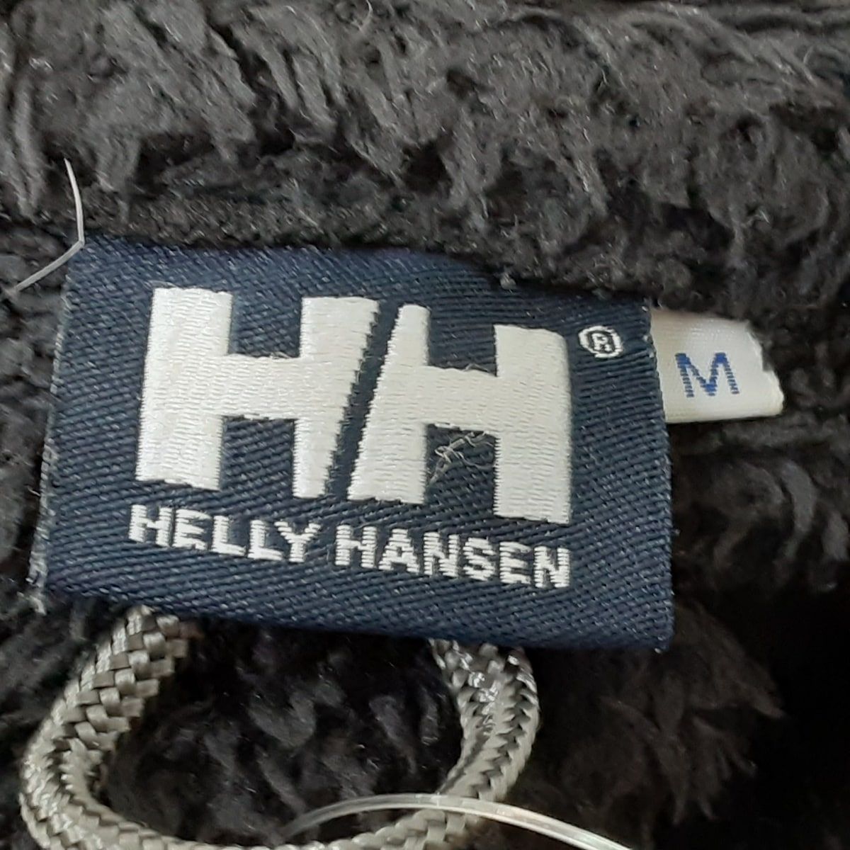 HELLY HANSEN(ヘリーハンセン) ブルゾン サイズM レディース美品  - 黒 長袖/ジップアップ/冬