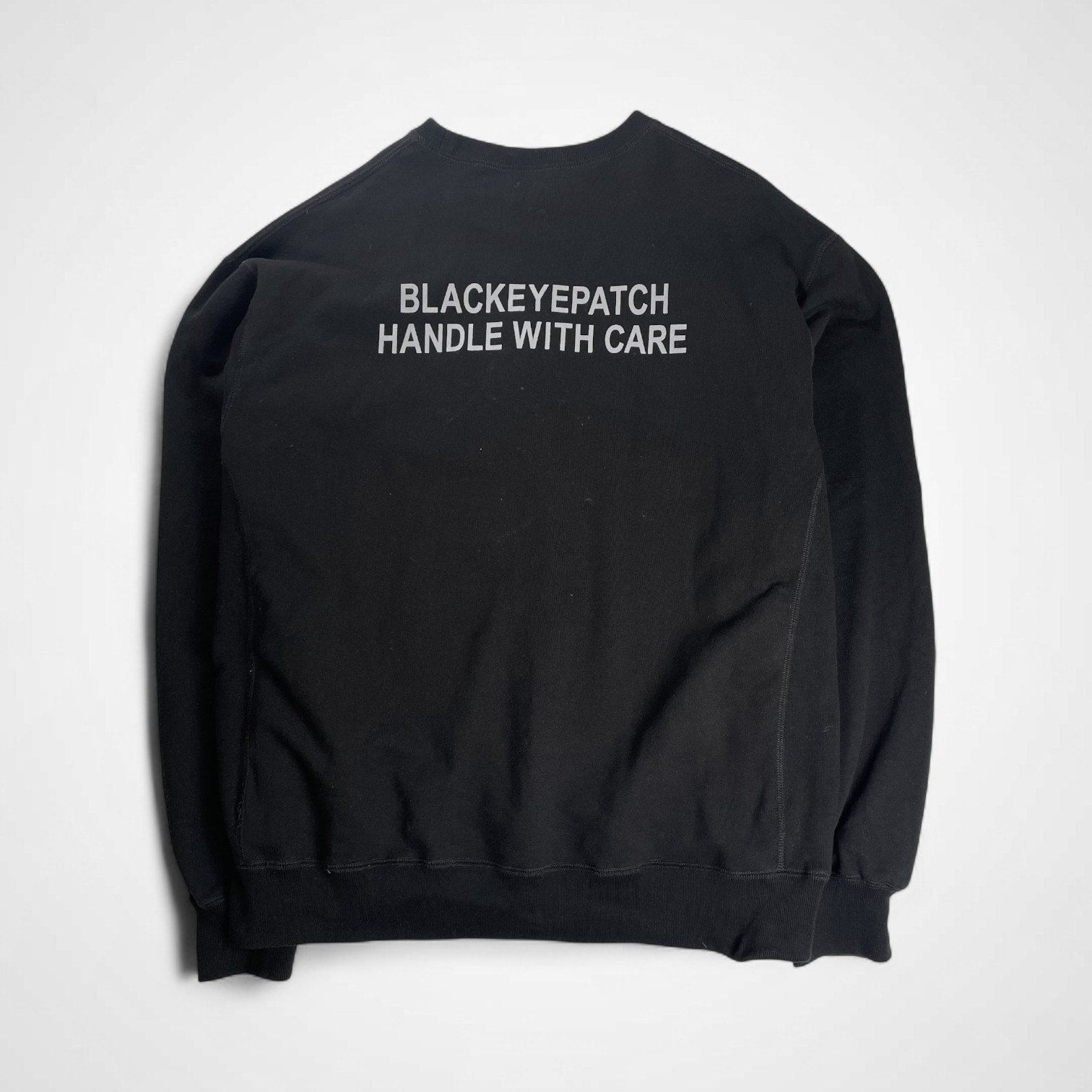 BLACK EYE PATCH ブラックアイパッチ / HANDLE WITH CARE CREW SWEAT 