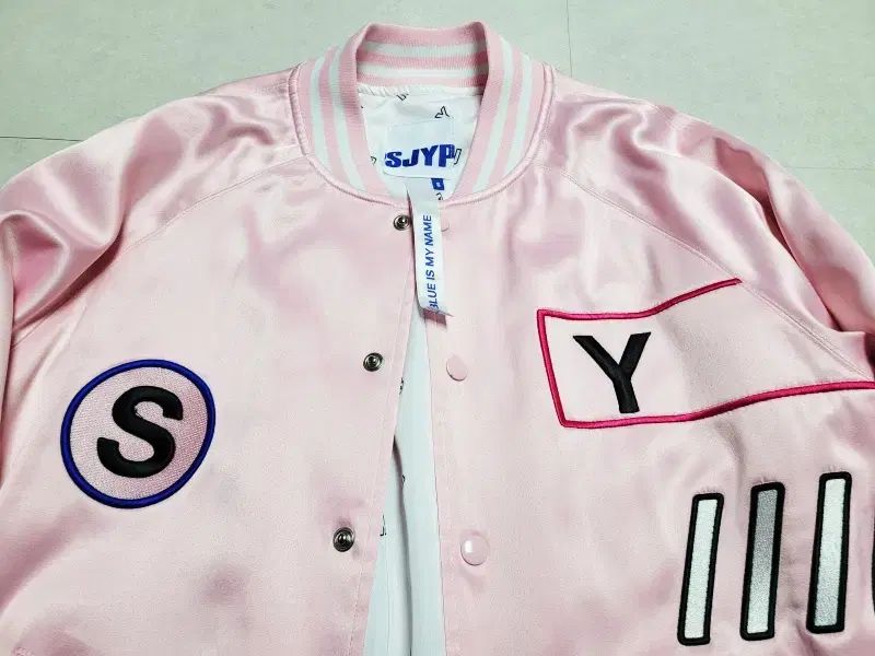 SJYP ピンクバーシティジャケット