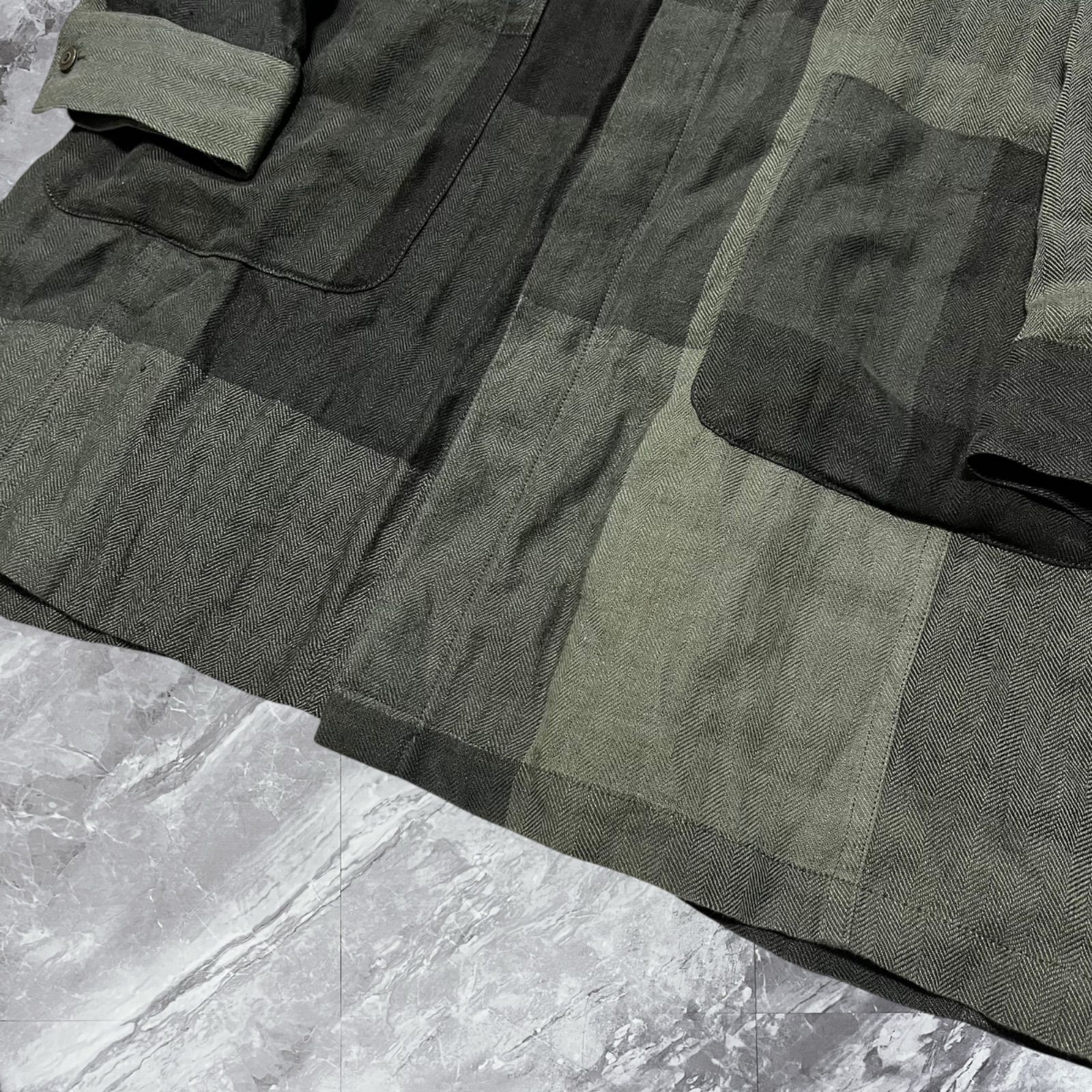 大きいサイズ ISAMU KATAYAMA BACKLASH イサムカタヤマバックラッシュ ステン コート ロングコート チェック ヘリンボーン リネン 麻 カンガルー革 本革 比翼ボタン グレー系 灰色 サイズXL