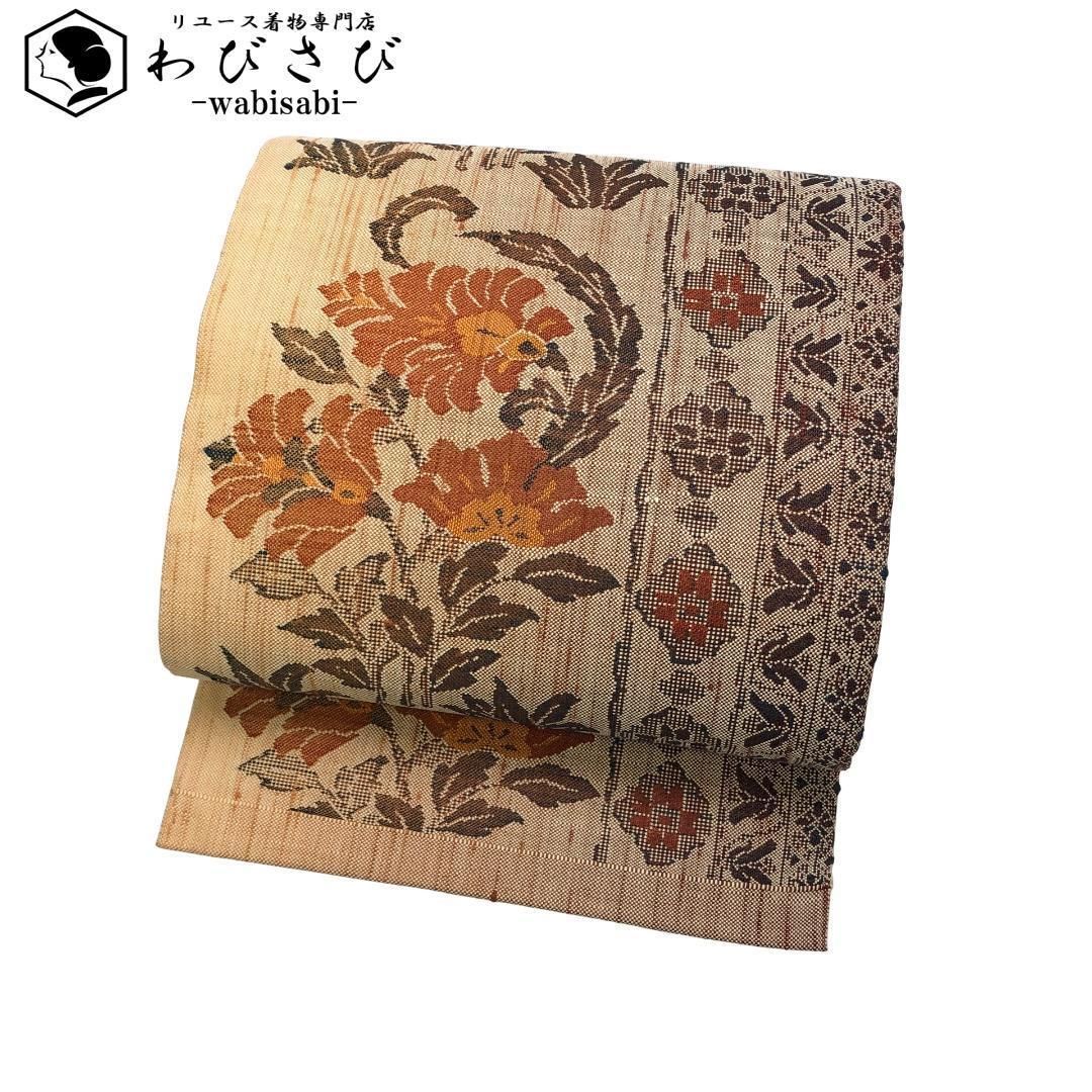 名古屋帯 紬 抽象花模様 薄柑子色 O-5297 名古屋帯 紬 抽象花模様 薄柑子色 O-5297 柑子 色