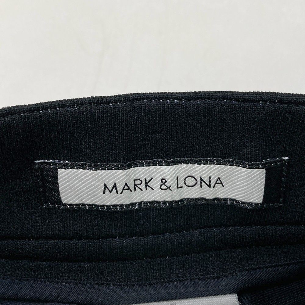 サイズ：48 MARK&LONA マークアンドロナ MLM-1C-AT04 ストレッチパンツ ロゴ柄 ブラック系 [240101413492] ゴルフウェア メンズ ストスト サイズ：48 MARK&LONA マークアンドロナ MLM-1C-AT04 ストレッチ