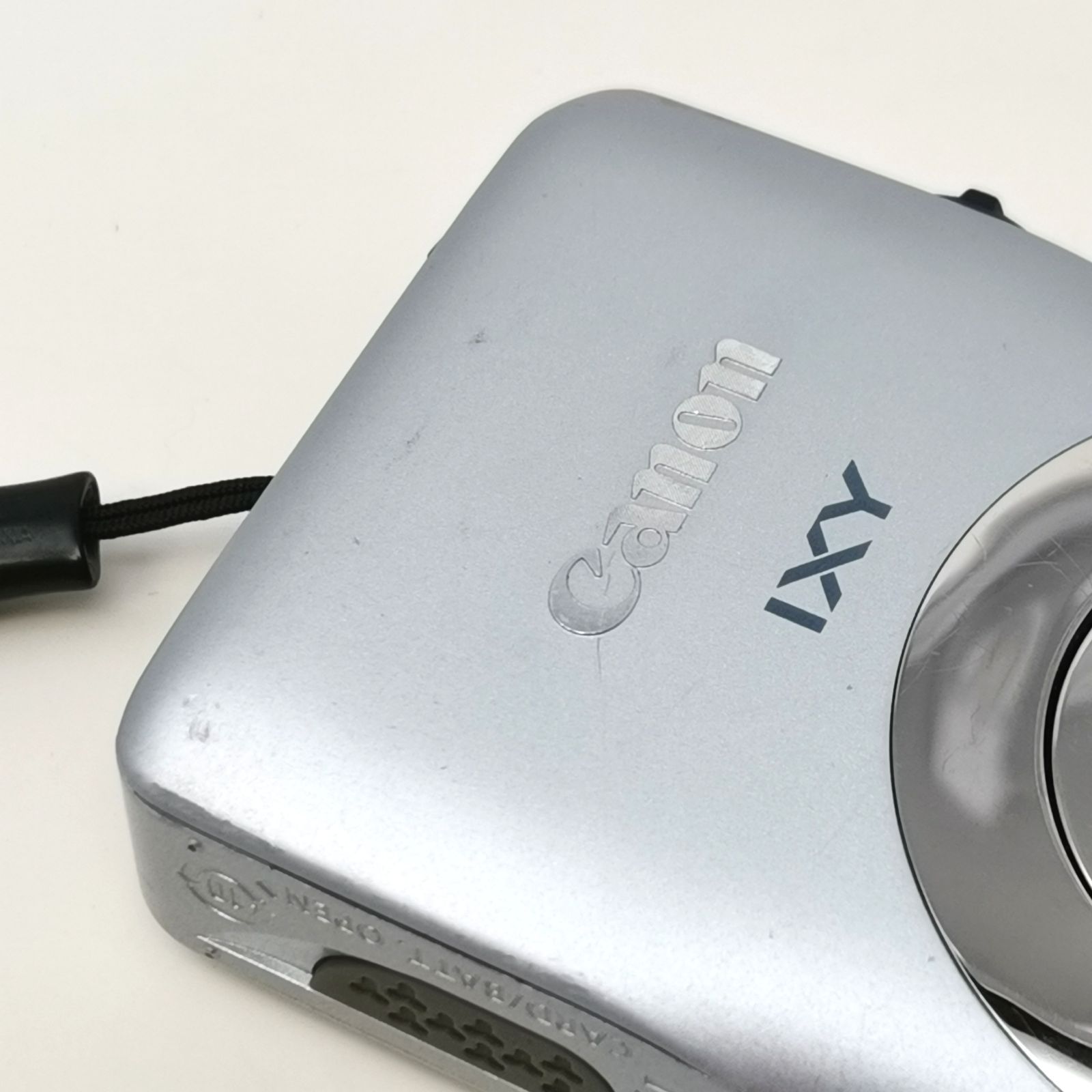 ノゾミイシグロ コート　キャノン　IXY 2点セット キャノン IXY 200F シルバーPC1469 動作確認済み SDカード2GB