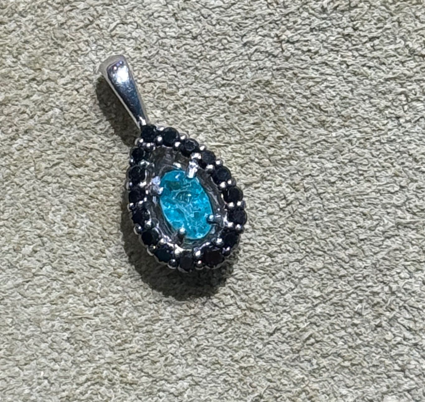 Pt900 パライバトルマリン0.10ct ブラックダイヤ0.12ct トップ - メルカリ