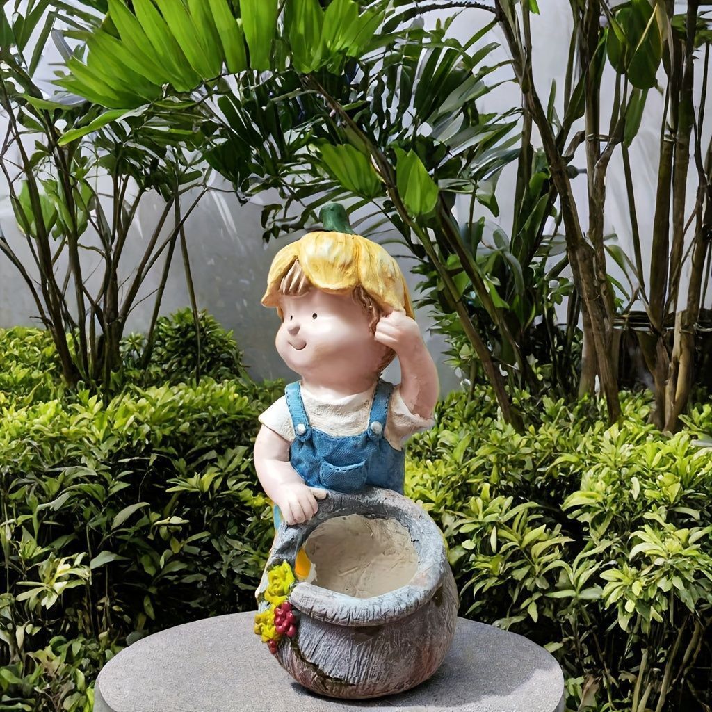 壷を持った少年