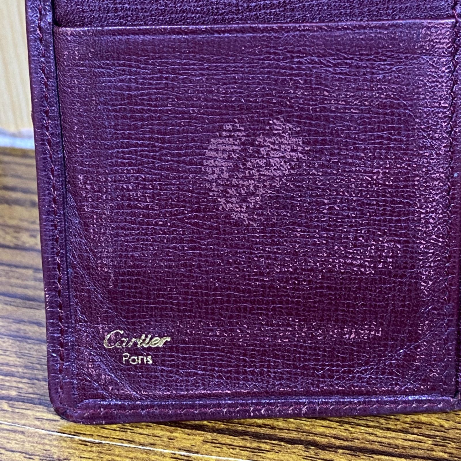 55 cartier カルティエ 二つ折り財布 マストライン レザー ボルドー系