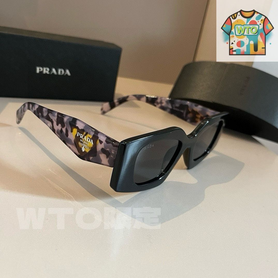 PRADA 定番キャットアイサングラス！ Prada Eyewear キャットアイ サングラス | ブラック | FARFETCH JP
