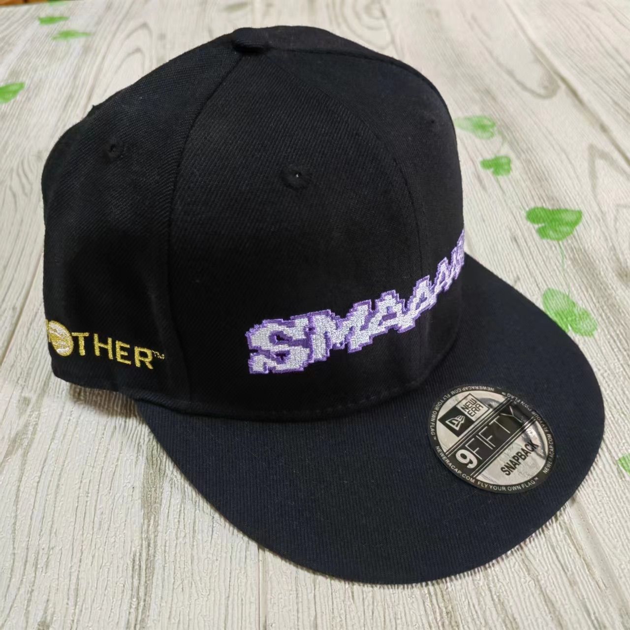 新品未使用！MOTHER2×ニューエラ 9FIFTY ™コラボキャップ SMAAAASH!! - メルカリ