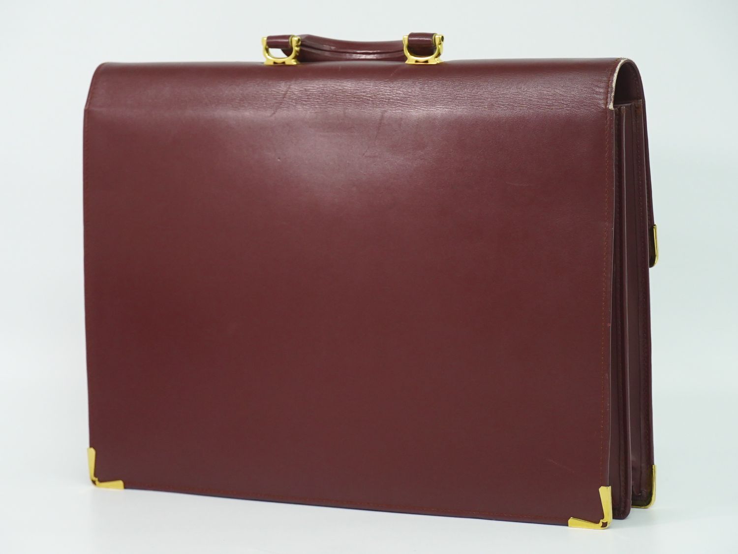 カルティエ ビジネスバッグ ボルドー マスト 美品 レザー 中古 Cartier