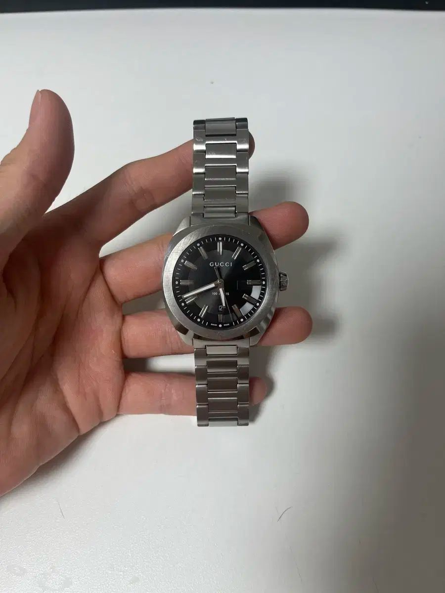 GUCCI グッチ スチール 男性 時計 ブラック メタル GG2570