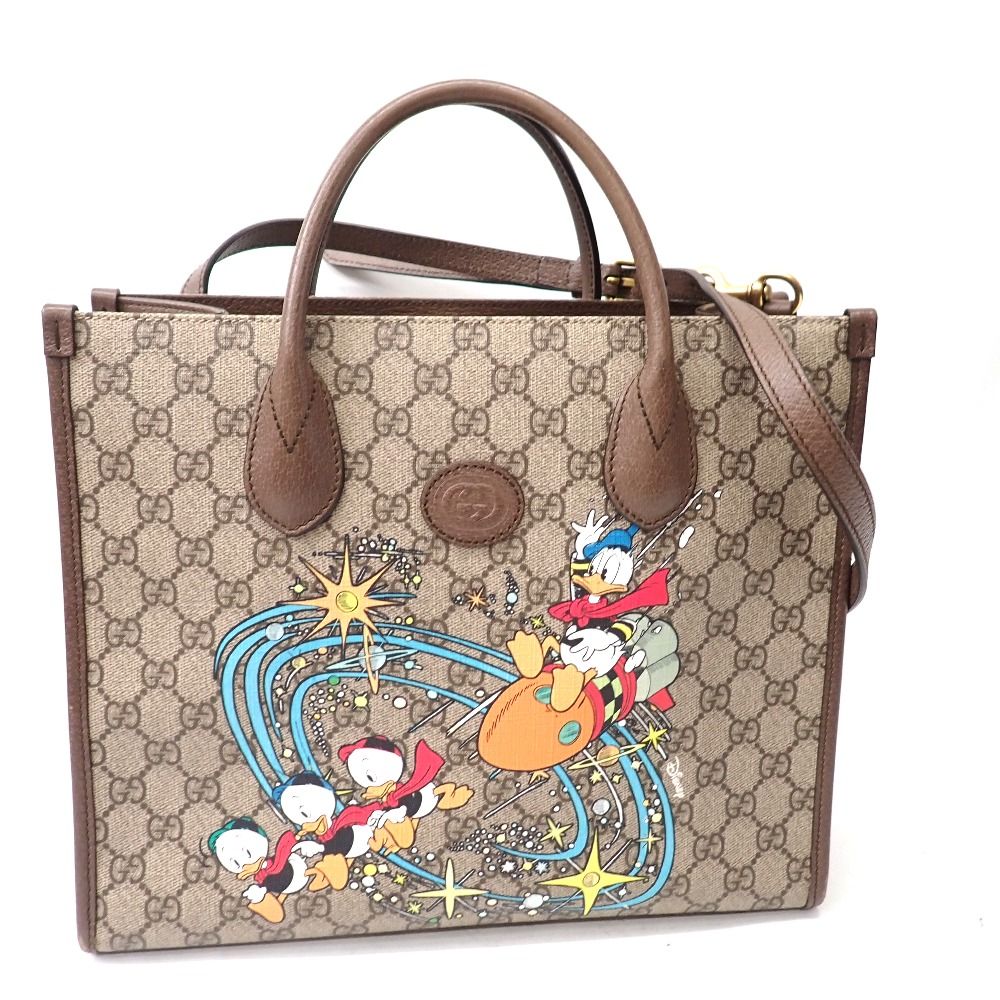 Ft1085541 グッチ トートバッグ GGスプリーム ディズニーコラボ ドナルドダック 648134 ブラウン メンズ GUCCI 中古