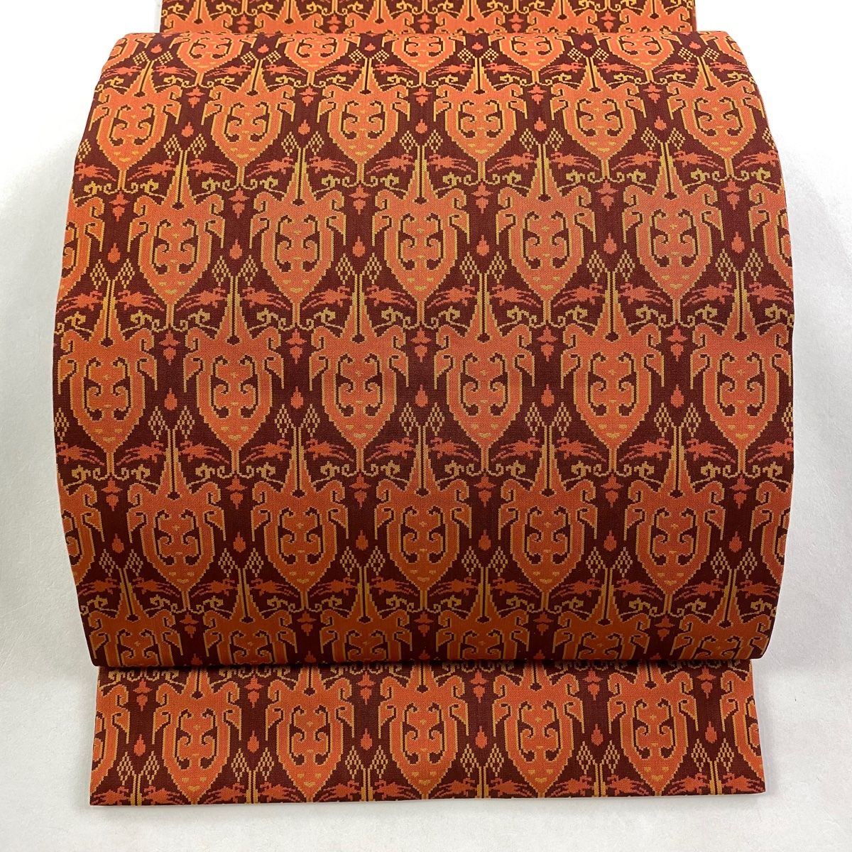 開き名古屋帯 名品 龍村美術織物 幾何学模様 赤茶 正絹