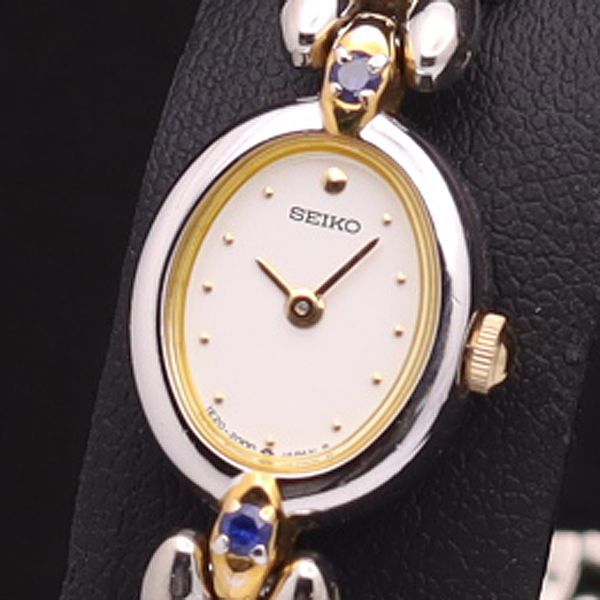 稼働 セイコー QZ 1E20-6160 石付 オーバル 白文字盤 レディース腕時計 