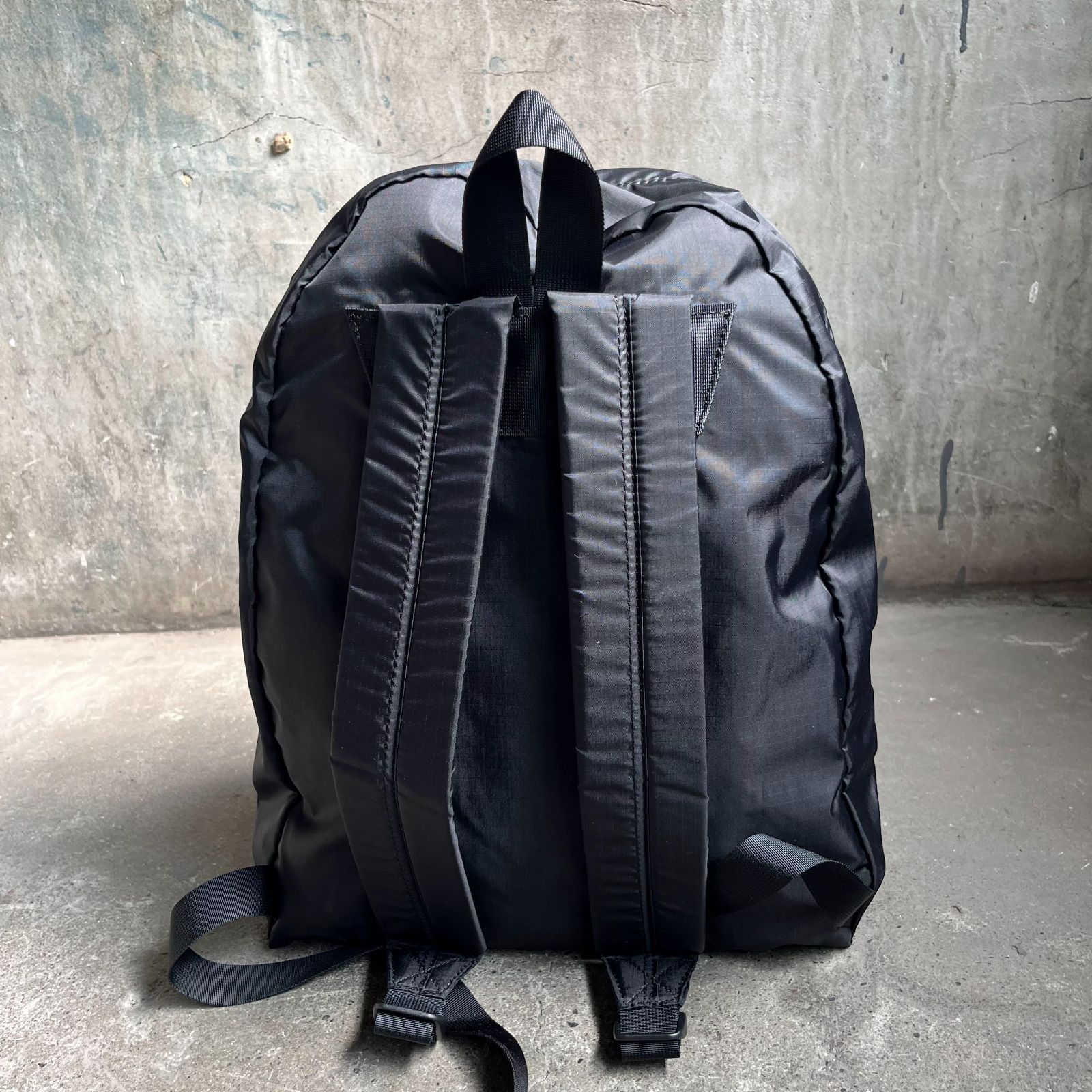 コムデギャルソン　リュックサック　ブラック　ロゴプリント　バックパック Black Comme Des Garçons ロゴタグ バックパック | ブラック