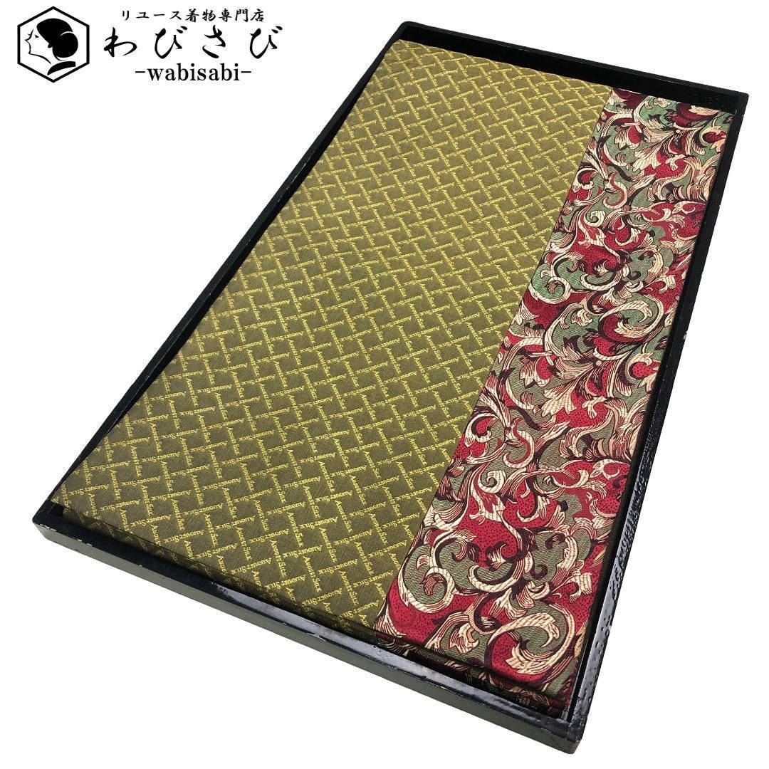 袋帯 花唐草模様 英字の格子柄 媚茶色 ガー O-5474