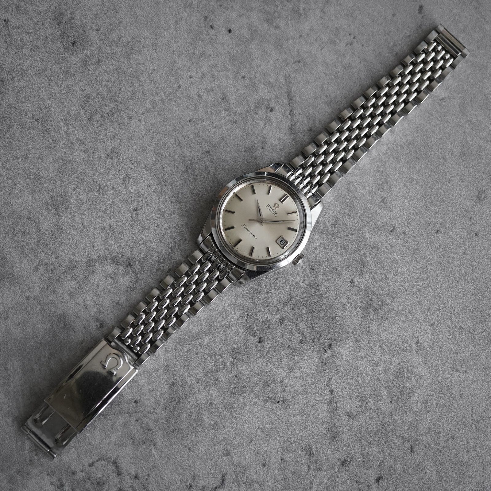 OMEGA