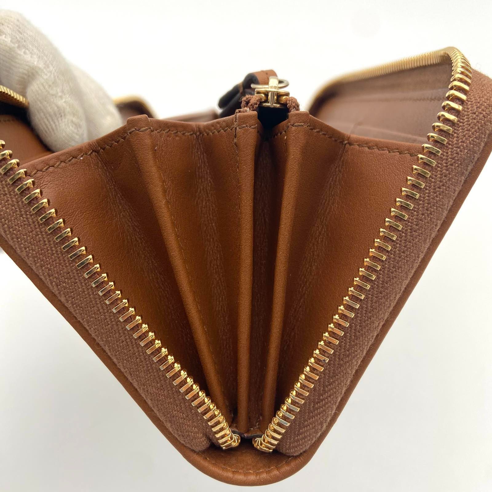 すぐ届く！GUCCI GGエンブレム ラウンドジップウォレット 長財布 org.jpg