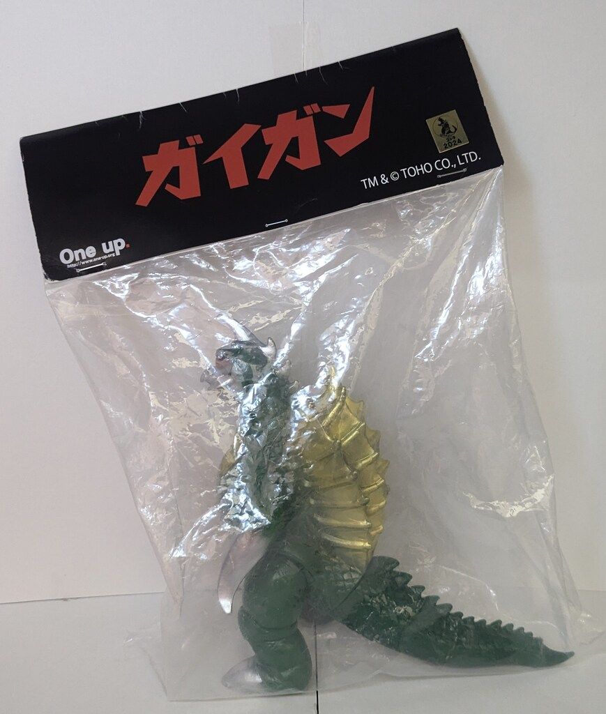 One up. ガイガン 緑/銀金