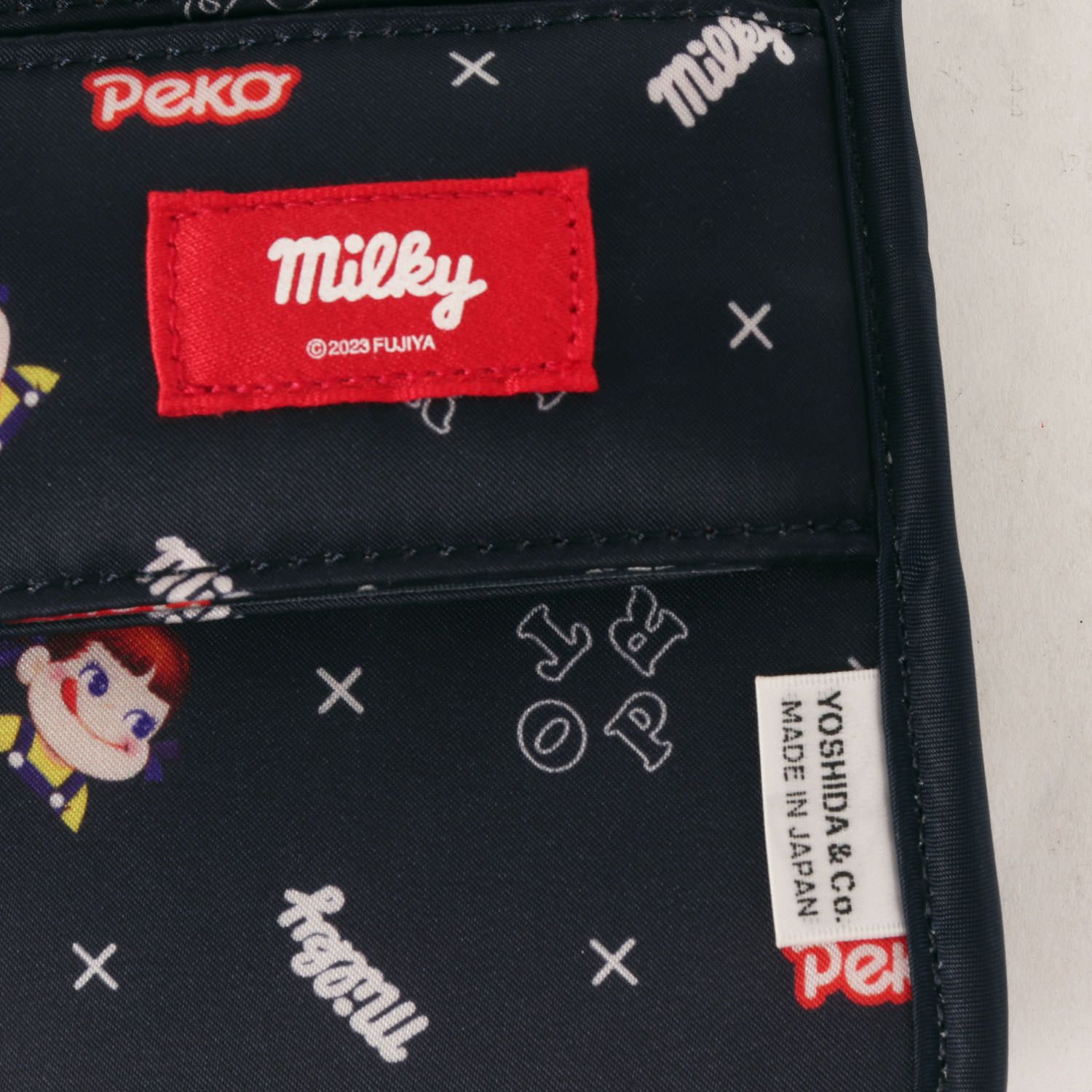 POTR ピー・オー・ティー・アール バッグ / 23AW milky ペコちゃん柄 モバイル ショルダーバッグ / ポーチ (MOBILE SHOULDER BAG) / ネイビー 紺 / ブランド カバン コラボ【メンズ】【中古】【新品同様】【K4365】 新品同様】POTR ピー・オー・ティー・アール バッグ / 23AW milky ペコ