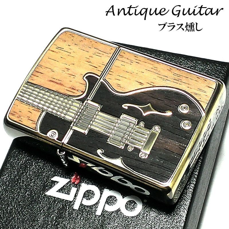 オシャレなギターの付いたZIPPOです。値下げました。 ZIPPO ライター アンテーク ギター ジッポ アンテークブラス