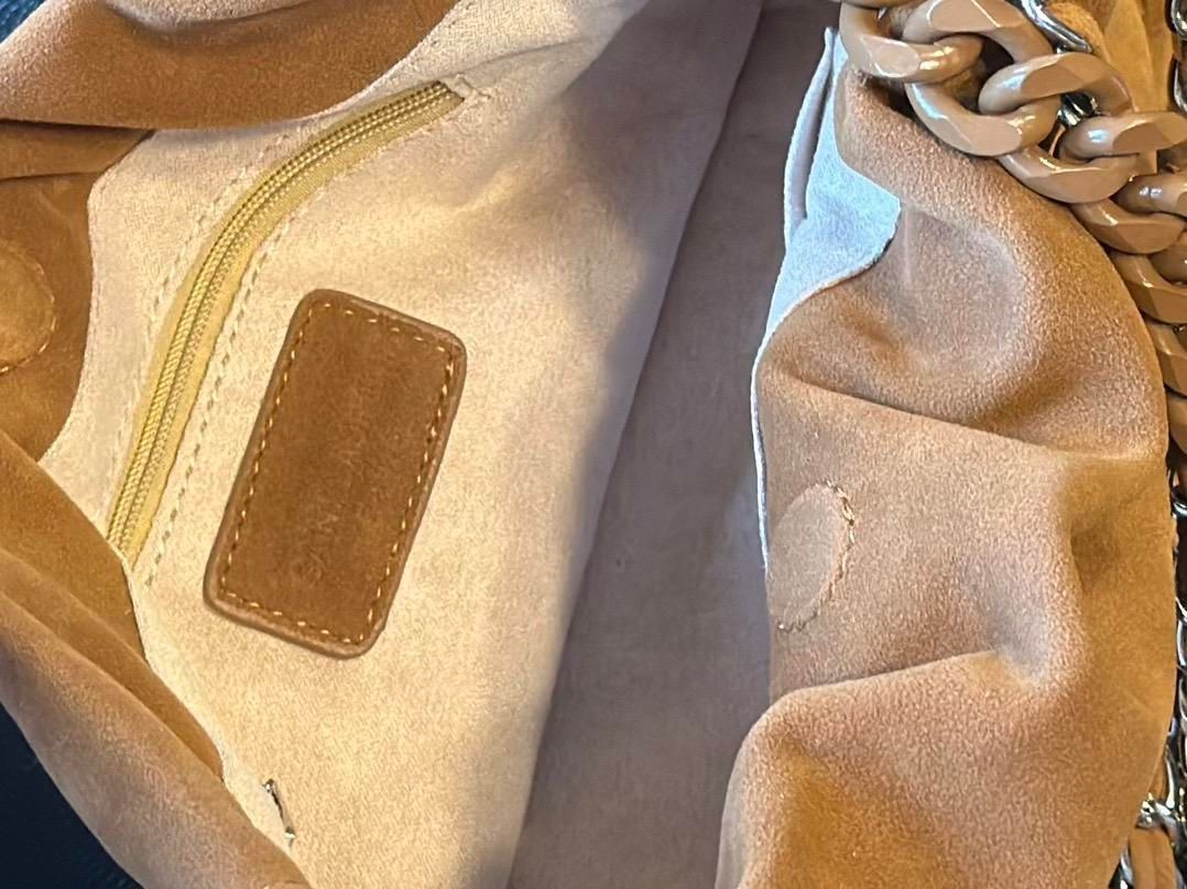 YSLサンローランの スエード女性用アンダーアームバッグ｜