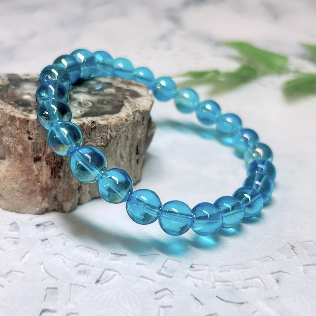 とても綺麗なアクアオーラ水晶！ E13911】アクアオーラ水晶 8㎜ オーラ水晶 ブレスレット 金属 - メルカリ