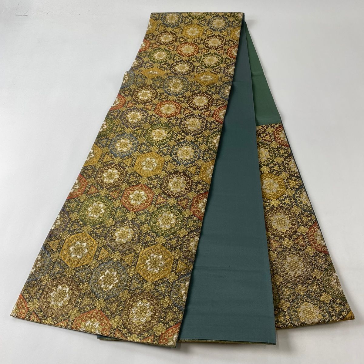 袋帯 美品 名品 華文 花唐草 輪奈織 金糸 黄土色 六通 正絹